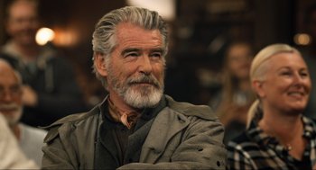 Movie still from “Eurovision Song Contest: The Story of Fire Saga” (2020), directed by David Dobkin – An older man with a beard; Close Up shot, Over the shoulder angle