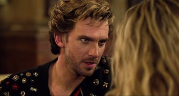 Movie still from “Eurovision Song Contest: The Story of Fire Saga” (2020), directed by David Dobkin – A person wearing a leather jacket; Close Up shot, Over the shoulder angle