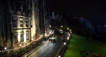 Movie still from “Eurovision Song Contest: The Story of Fire Saga” (2020), directed by David Dobkin – A city street at night lit up by street lights; Extreme Wide shot, High angle