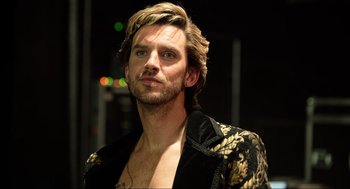 Movie still from “Eurovision Song Contest: The Story of Fire Saga” (2020), directed by David Dobkin – A person wearing a jacket; Close Up shot, Low angle