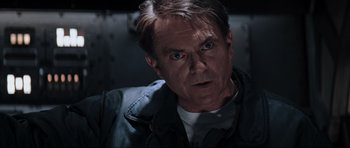 Movie still from “Event Horizon” (1997), directed by Paul W.S. Anderson – A person wearing a jacket; Close Up shot, Over the shoulder angle