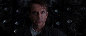 Movie still from “Event Horizon” (1997), directed by Paul W.S. Anderson – A person wearing a black jacket; Close Up shot, Over the shoulder angle