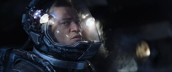 Movie still from “Event Horizon” (1997), directed by Paul W.S. Anderson – A person wearing a helmet; Close Up shot, Over the shoulder angle