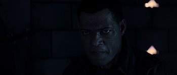 Movie still from “Event Horizon” (1997), directed by Paul W.S. Anderson – A person wearing a black shirt; Close Up shot, Over the shoulder angle