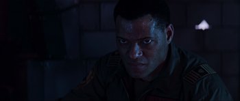 Movie still from “Event Horizon” (1997), directed by Paul W.S. Anderson – A person wearing a military uniform; Close Up shot, High angle