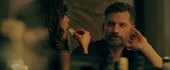 Movie still from “A Taste of Hunger” (2021), directed by Christoffer Boe – A man and a woman are eating food together; Close Up shot, Over the shoulder angle