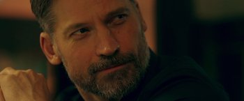 Movie still from “A Taste of Hunger” (2021), directed by Christoffer Boe – A person with a beard; Close Up shot, Over the shoulder angle