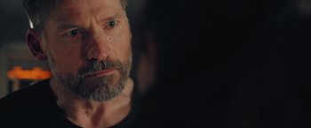 Movie still from “A Taste of Hunger” (2021), directed by Christoffer Boe – A person with a beard; Close Up shot, Over the shoulder angle