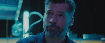 Movie still from “A Taste of Hunger” (2021), directed by Christoffer Boe – A person with a beard; Close Up shot, Over the shoulder angle