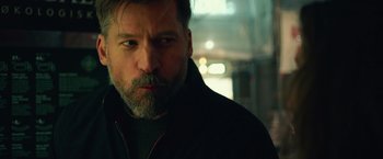 Movie still from “A Taste of Hunger” (2021), directed by Christoffer Boe – A person with a beard; Close Up shot, Low angle