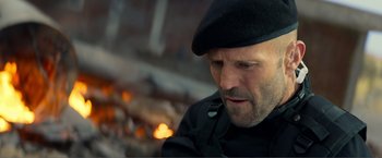 Movie still from “Expend4bles” (2023), directed by Scott Waugh – A person wearing a hat; Close Up shot, Low angle