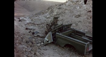 Movie still from “Explorer” (2022), directed by Matthew Dyas – A truck that has been broken down on the side of the road; Wide shot, High angle