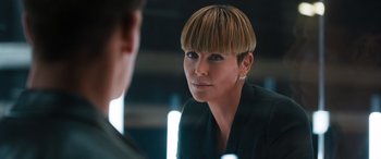Movie still from “F9: The Fast Saga” (2021), directed by Justin Lin – A person with a short haircut; Close Up shot, Over the shoulder angle