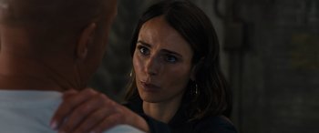 Movie still from “F9: The Fast Saga” (2021), directed by Justin Lin – A person looking at a person; Close Up shot, Over the shoulder angle