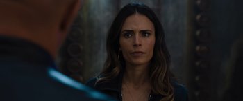 Movie still from “F9: The Fast Saga” (2021), directed by Justin Lin – A person wearing a black jacket; Close Up shot, Over the shoulder angle