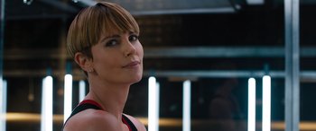 Movie still from “F9: The Fast Saga” (2021), directed by Justin Lin – A person wearing a red shirt; Close Up shot, Over the shoulder angle