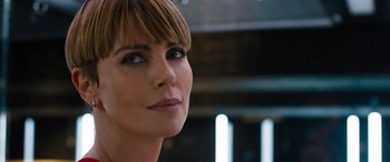 Movie still from “F9: The Fast Saga” (2021), directed by Justin Lin – A person with short brown hair; Close Up shot, Over the shoulder angle