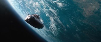 Movie still from “F9: The Fast Saga” (2021), directed by Justin Lin – An image of a boat floating in the ocean; Extreme Wide shot, Overhead angle