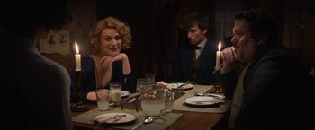 Movie still from “Fantastic Beasts and Where to Find Them” (2016), directed by David Yates – A man and a woman sitting at a dinner table; Medium shot, Over the shoulder angle