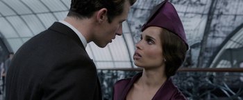 Movie still from “Fantastic Beasts: The Crimes of Grindelwald” (2018), directed by David Yates – A man and a woman looking at one another; Close Up shot, Over the shoulder angle