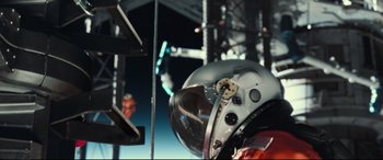 Movie still from “Ad Astra” (2019), directed by James Gray – The helmet of a spaceman; Medium shot, Low angle
