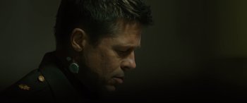 Movie still from “Ad Astra” (2019), directed by James Gray – A person with a earring; Close Up shot, Low angle