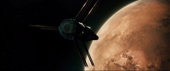 Movie still from “Ad Astra” (2019), directed by James Gray – An image of a space station in the middle of the night; Extreme Wide shot, Low angle