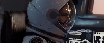 Movie still from “Ad Astra” (2019), directed by James Gray – A person wearing a space helmet; Close Up shot, Overhead angle
