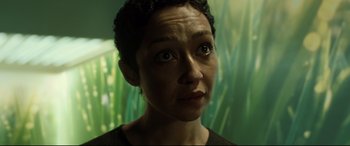 Movie still from “Ad Astra” (2019), directed by James Gray – A person with short black hair; Close Up shot, Over the shoulder angle