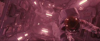 Movie still from “Ad Astra” (2019), directed by James Gray – An image of a person in a space suit; Wide shot, Overhead angle
