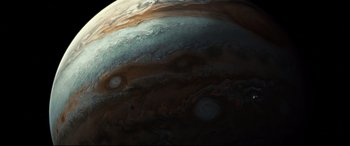 Movie still from “Ad Astra” (2019), directed by James Gray – View of the planet jupiter taken from space; Extreme Wide shot, Overhead angle