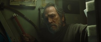 Movie still from “Ad Astra” (2019), directed by James Gray – An old man with a long gray beard; Close Up shot, Low angle