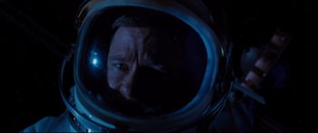 Movie still from “Ad Astra” (2019), directed by James Gray – A man's face in a space suit; Close Up shot, Low angle