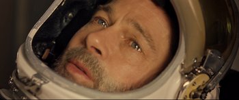 Movie still from “Ad Astra” (2019), directed by James Gray – A man's face with blue eyes; Close Up shot, Overhead angle