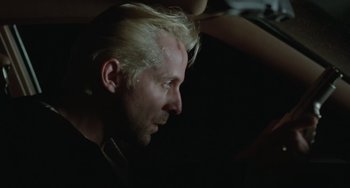 Movie still from “Fargo” (1996), directed by Ethan Coen – A person with blonde hair; Close Up shot, Over the shoulder angle