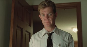 Movie still from “Fargo” (1996), directed by Ethan Coen – A person wearing a shirt and a tie; Close Up shot, Low angle
