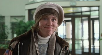 Movie still from “Fargo” (1996), directed by Ethan Coen – A person wearing a jacket and a hat; Close Up shot, Low angle