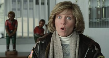 Movie still from “Fargo” (1996), directed by Ethan Coen – A person wearing a jacket and a scarf; Close Up shot, Low angle