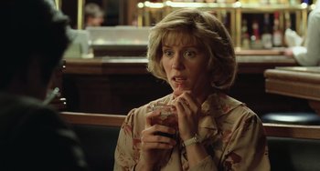 Movie still from “Fargo” (1996), directed by Ethan Coen – A woman holding a sandwich in her hands; Close Up shot, Low angle