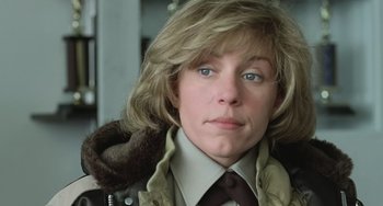 Movie still from “Fargo” (1996), directed by Ethan Coen – A person wearing a jacket; Close Up shot, Low angle