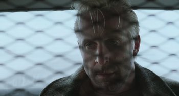 Movie still from “Fargo” (1996), directed by Ethan Coen – A person looking through a window; Close Up shot, Low angle