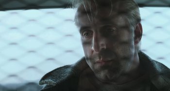 Movie still from “Fargo” (1996), directed by Ethan Coen – A person looking out a window; Close Up shot, Low angle