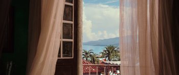 Movie still from “Fast & Furious 6” (2013), directed by Justin Lin – A view of a bay from a window with curtains open; Extreme Wide shot, Low angle