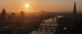 Movie still from “Fast & Furious 6” (2013), directed by Justin Lin – The sun is setting over a large city; Extreme Wide shot, High angle