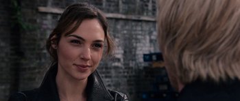 Movie still from “Fast & Furious 6” (2013), directed by Justin Lin – A person wearing a leather jacket; Close Up shot, Over the shoulder angle