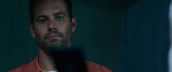 Movie still from “Fast & Furious 6” (2013), directed by Justin Lin – A person with a laptop; Close Up shot, Over the shoulder angle