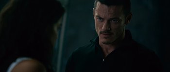 Movie still from “Fast & Furious 6” (2013), directed by Justin Lin – A person wearing a black shirt; Close Up shot, Over the shoulder angle