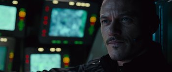 Movie still from “Fast & Furious 6” (2013), directed by Justin Lin – A person in a room; Close Up shot, Over the shoulder angle