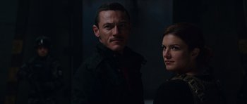 Movie still from “Fast & Furious 6” (2013), directed by Justin Lin – A man and a woman standing next to each other in the dark; Close Up shot, Low angle