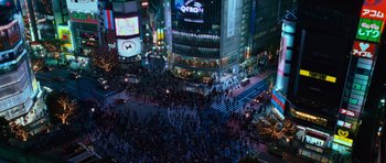 Movie still from “Fast & Furious 6” (2013), directed by Justin Lin – An aerial view of a busy city at night; Extreme Wide shot, Overhead angle